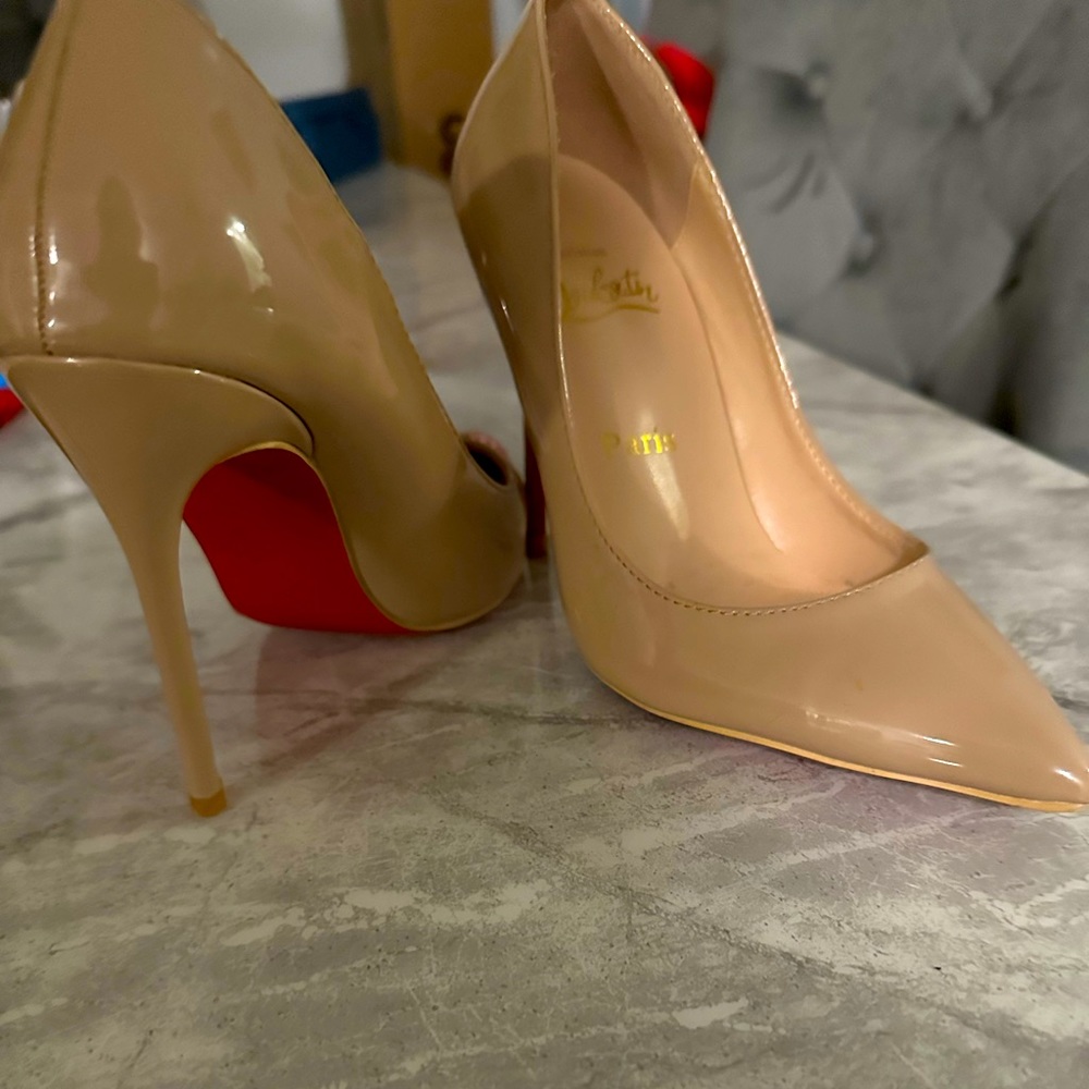 Red bottom shoes .